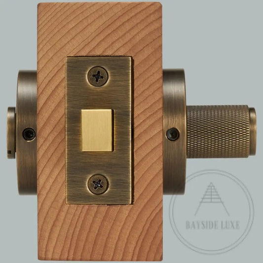 Door Handle Bayside Luxe - Antique Brass Cross Knurled Dead Bolt Thumb Turn Lock