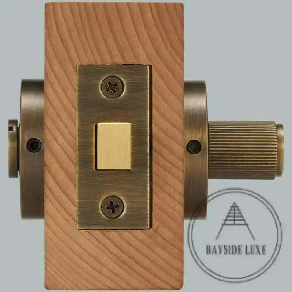 Door Handle Bayside Luxe - Antique Brass Linear Knurled Dead Bolt Thumb Turn Lock