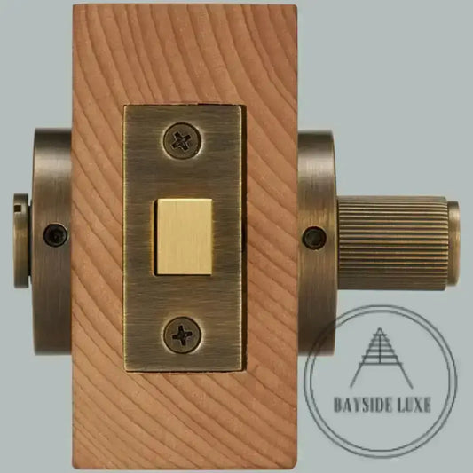 Door Handle Bayside Luxe - Antique Brass Linear Knurled Dead Bolt Thumb Turn Lock